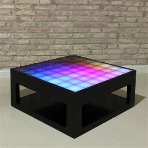 Consider positioning a long coffee table directly in front of the sofa. Interactive coffee table with LED lights Mypixeek.