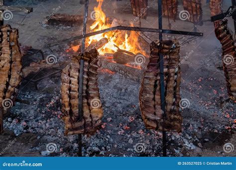 Asado Traditional Barbecue Dish In Argentina Roasted Meat Cooked On A