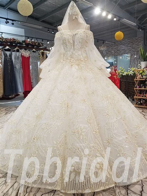 A beautiful spring wedding dress collection featuring the biggest fashion trends. Ball Gown Wedding Dress With Long Train Luxury Bridal Dress | Ball gowns wedding, Big wedding ...