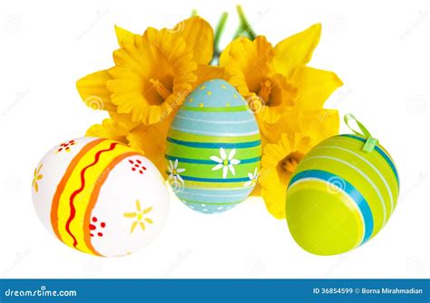 Three Isolated Colorful Easter Eggs Against Yellow Daffodils Stock