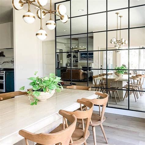 Really Loving How The Mirror Wall In This Dining Space By