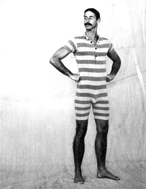 ca 1910s man showing off his new and very fashionable knit swiming suit vintage swimwear
