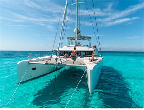 Freedom Luxury Charter Sailing Catamaran Guests Bow Select Yachts