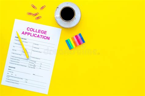 Apply College Empty College Application Form Near Coffee Cup And Stationery On Yellow