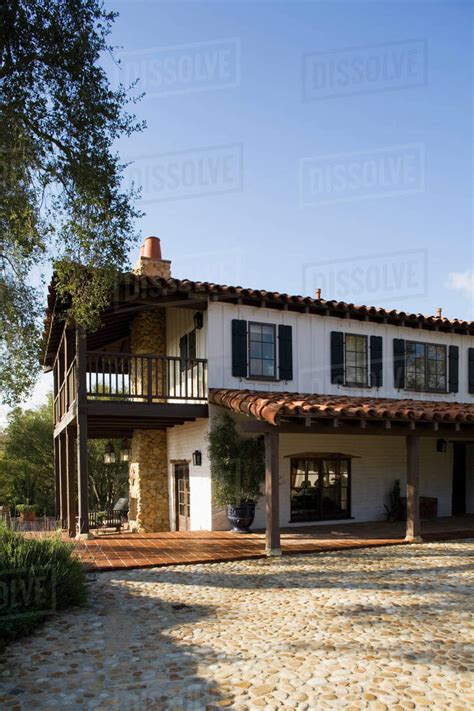 Exterior Of Spanish Style Home And Landscape Stock Photo Dissolve