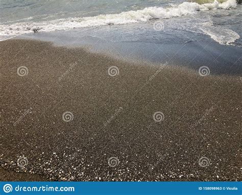 View Of The Sea During Sunset Glitter Waves On A Sandy Beach Summer