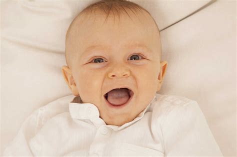 Portrait Of Laughing Baby Boy Stock Photo