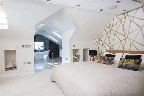 In this top floor master suite, neil dusheiko architects concealed dimmable led lights have been fitted along the perimeter to give the timber structure a soft glow. open-plan master bedroom and ensuite in a loft conversion ...