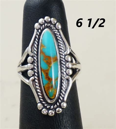Item E Navajo Oblong Kingman Turquoise Sterling Silver Decorative