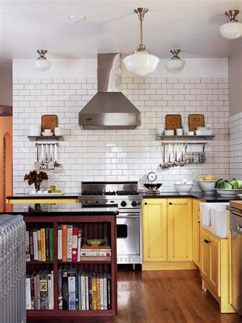 If you're not ready for a complete cabinet overhaul, consider a fresh coat of paint on lower cabinets or highlight an island with a different color. Best Colors for Small Kitchens | Better Homes & Gardens