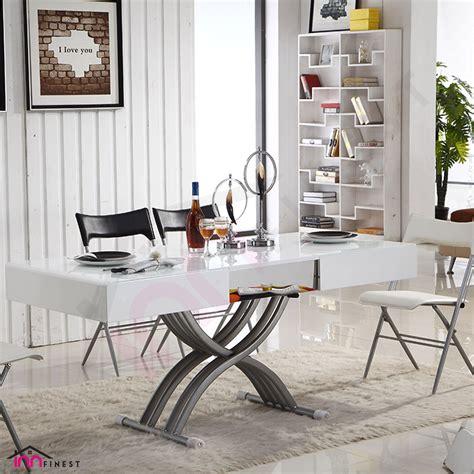 Perhaps your coffee table doubles as a dining table? Adjustable Coffee/Dining Table, Multipurpose Space Saving ...