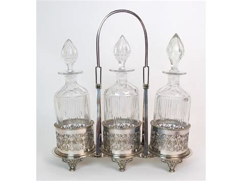 Price Guide For A Silver Plated 3 Bottle Decanter Standwith