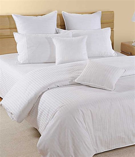I haven't taken them out of the package but they are a yellowish (vs brownish or almond) color. Bombay Dyeing King size Stripes Cotton Double Bed Sheet ...
