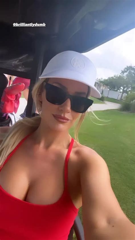 Paige Spiranac Shows Off Massive Cleavage In A Tiny Low Cut Red Dress During A Round Of Golf