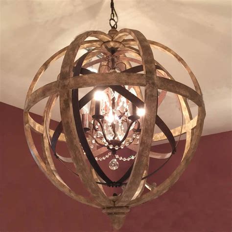 The orb is not the only thing you can carry. wooden orb chandelier metal orb detail and crystal by ...