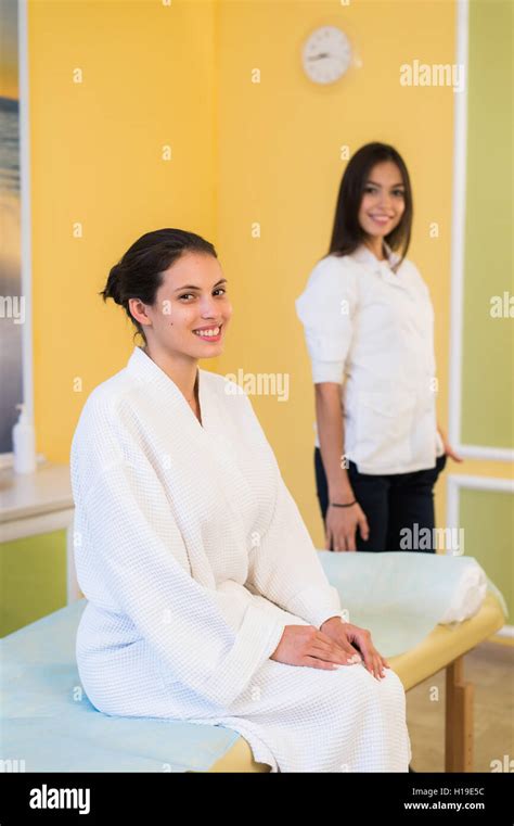 Woman Beautician Doctor With Patient In Spa Wellness Center Young Female Professional