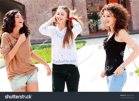 Three Beautiful Girls Laughing And Having Fun Stock Photo Shutterstock