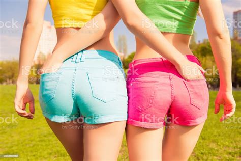 Close Up Photo Of Beautiful Shapely Womans Buttocks In Shorts Stock