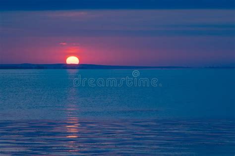 Beautiful Sunrise Over The Water Stock Photo Image Of Sundown Coast