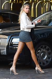 Charlotte Mckinney Flashes Toned Pins In Racy Grey Mini Dress During