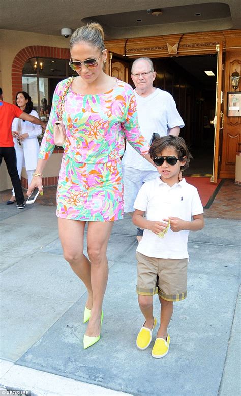 jennifer lopez cuts stylish figure in floral mini dress as she steps out with son max for doctor