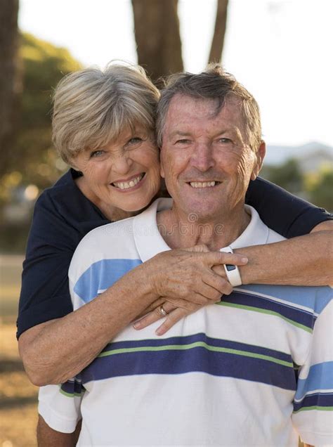 Portrait Of American Senior Beautiful And Happy Mature Couple Around 70