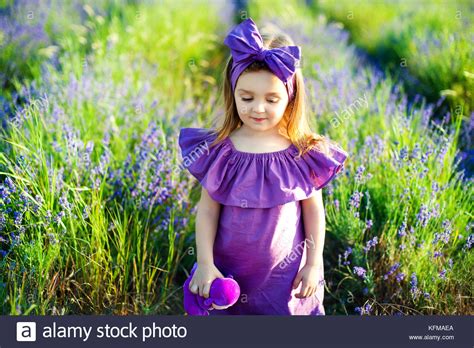 Portrait Of A Sad Curly Little Girl Stock Photo Alamy