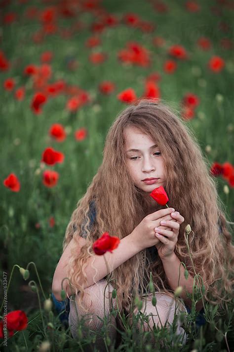 Little Girl And Poppies By Jovana Rikalo Stocksy United