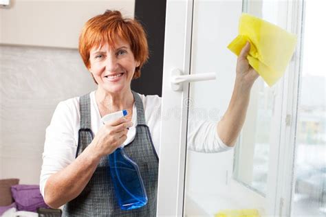 Mature Woman Cleaning Window Stock Image Image Of Cleaning Looking