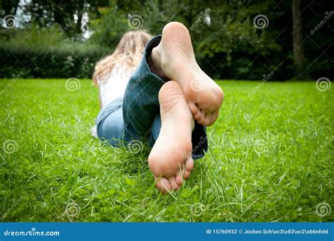 Feet Of A Young Woman Lying In The Grass Stock Photo Image 15760932