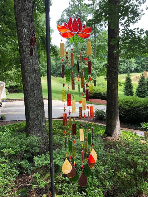 Support the glass inside the container with a small block of wood with some dense plastic foam on the top to cushion the glass. Pin on Stained Glass Wind Chimes!