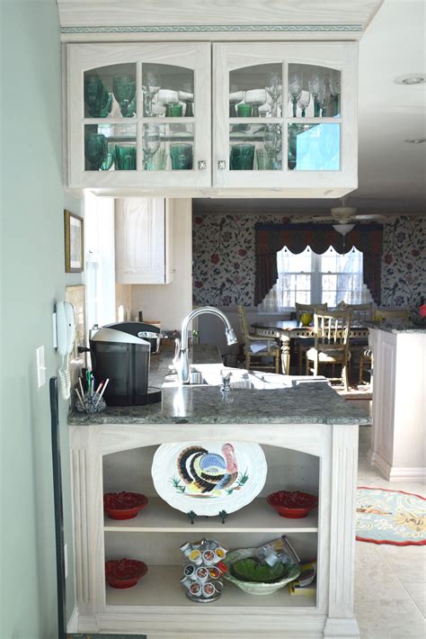 Using either bleach or a wood stain lightens up the color of the cabinets while preserving their natural look. Light Stain Kitchen Cabinets - Horst Cabinet Works