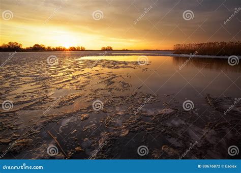Winter Landscape With River Reeds And Sunset Sky Stock Photo Image
