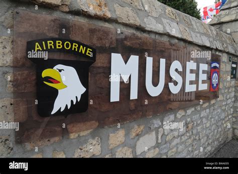 Sign At The Entrance To The Airborne Museum Sainte Mère Eglise
