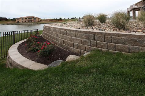 This may take you some time and a little physical work, but in the end you will have save money and have a sense of doing your own work. Retaining Walls - Project Type - Watkins Concrete Block