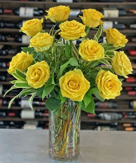 12 Yellow Roses One Dozen 12 Yellow Roses With Greenery Yellow