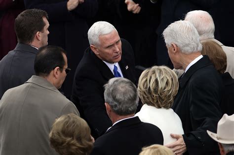 Photo Bill Clinton Comforts Hillary At Inauguration