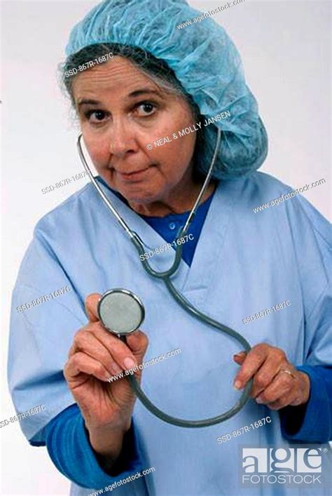 Close Up Of A Female Nurse Holding A Stethoscope Stock Photo Picture