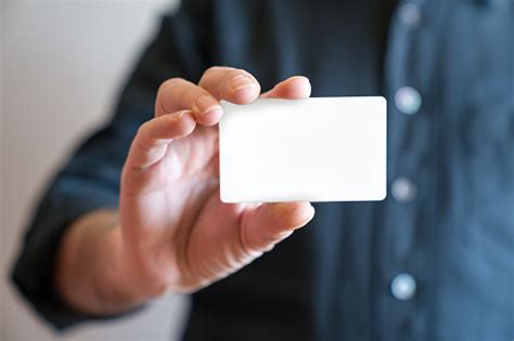 Maybe you would like to learn more about one of these? Hand Holding Blank White Credit Card Mockup Front Side View Plastic Bankcard Design Mock Up ...