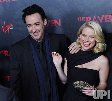 Photo John Cusack And Alice Eve Attend The Raven Premiere In Los