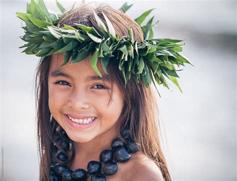 Portrait Of A Smiling Young Traditional Hawaiian Hula Dancer Girl By