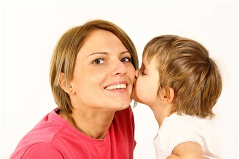 Premium Photo Daughter Is Kissing Her Mother Over White Background