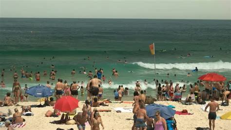 swimmers and beach goers at bondi beach australia s most famous beach stock video footage