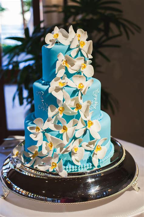 Such shades are prevalent in nature in the. Blue Wedding Cake, White Floral Accents