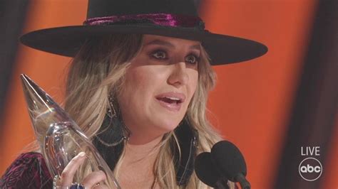 WATCH Lainey Wilson Accepts The Award For Female Vocalist Of The Year
