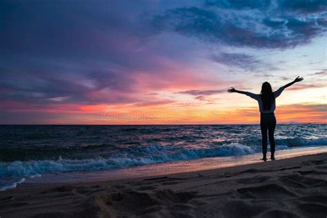 Young Beautiful Woman Enjoying Sea View On Sandy Beach Stock Photo