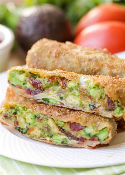 Brush remaining corners and edges of the wrapper with egg; Copycat Cheesecake Factory Avocado Egg Rolls (+VIDEO ...