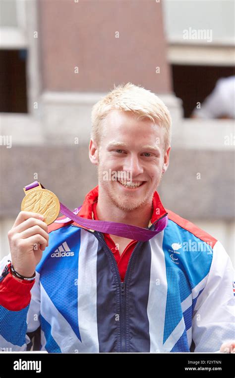 Paralympic Sprinter Jonnie Peacock Shows Off His Gold T44 100m Medal