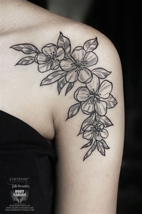 Decorative cross spread on chest. Here is a simple Shoulder Flower Tattoo for girls. # ...