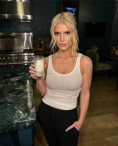 Jessica Simpson Shows Off Her Slim Figure In A Tight White Tank Top